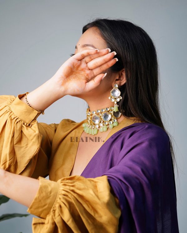Gold Plated Kundan Neckpiece With Earrings