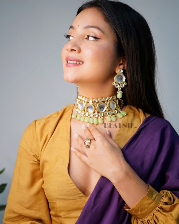 Gold Plated Kundan Neckpiece With Earrings