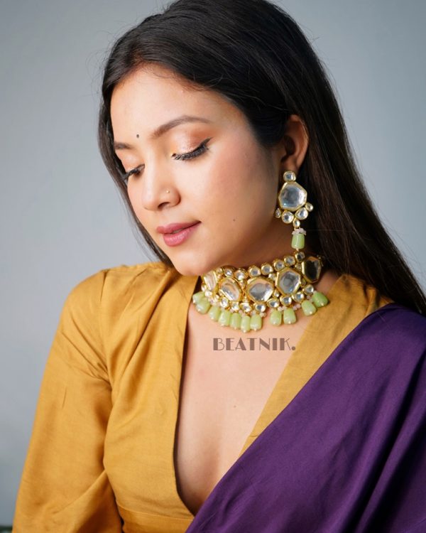 Gold Plated Kundan Neckpiece With Earrings