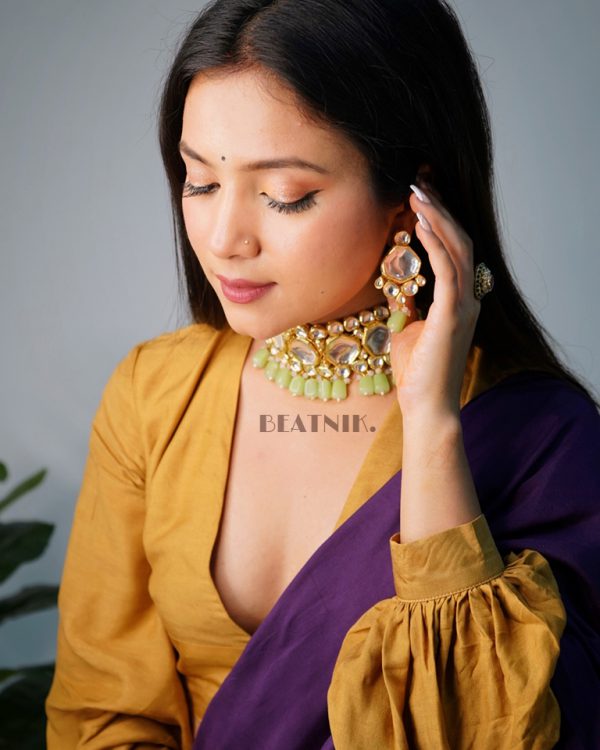 Gold Plated Kundan Neckpiece With Earrings