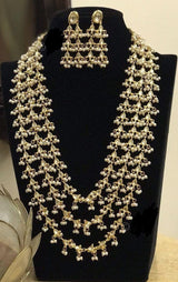 Gold Plated Kundan Studded & Beaded Layered Jewellery Set