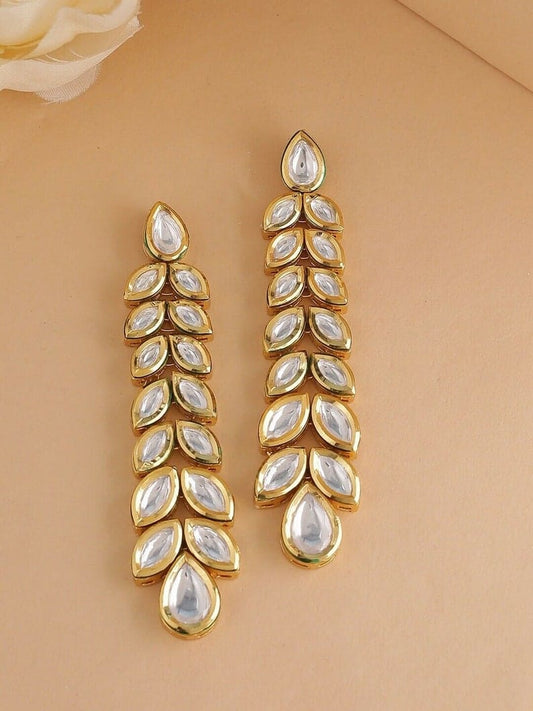 Gold Plated Kundan Floral And Leaf Carved Dangler Earrings