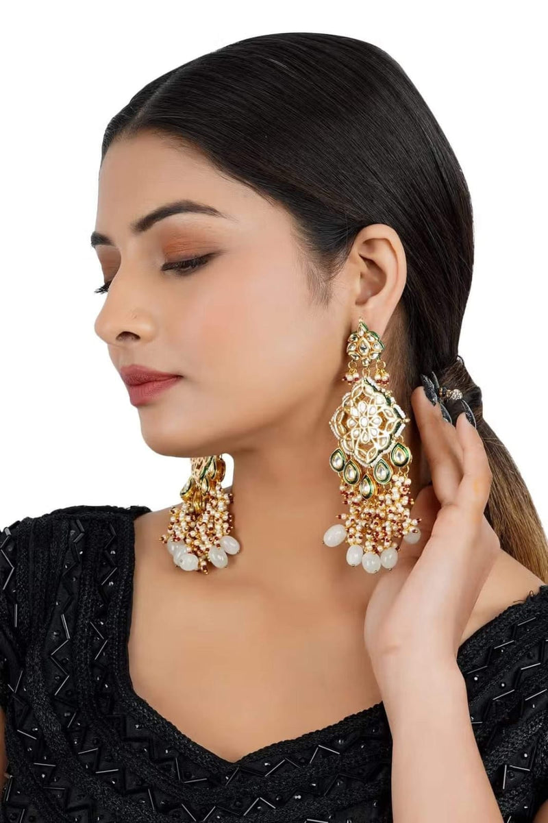 Gold Plated Kundan Floral And Leaf Carved Dangler Earrings