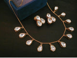 DESIGNER GOLD PLATED UNCUT POLKI KUNDAN NECKPIECE WITH EARRINGS