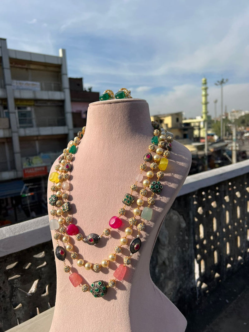 Gold-Plated Kundan-Studded & Pearl-Beaded Tripal-Stranded Handcrafted Nacklace With Earrings